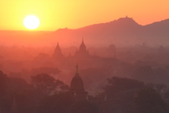 Sunrise is the main event in Bagan. Nearly every day hot air balloons are launched as the sun rises on a hazy field of temples.